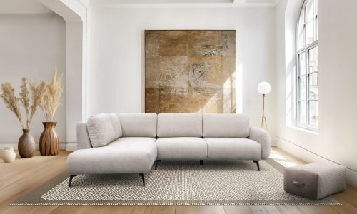 Grunge old accent coffee table near white sofa against arched window and white wall with big art poster frame. Minimalist, art deco interior design of modern living room, home.